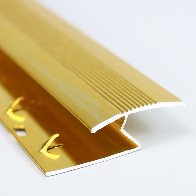 Tuile en aluminium d'équilibre de bande de couverture de bordure de tapis en métal d'alliage d'or durable fiable de représentation