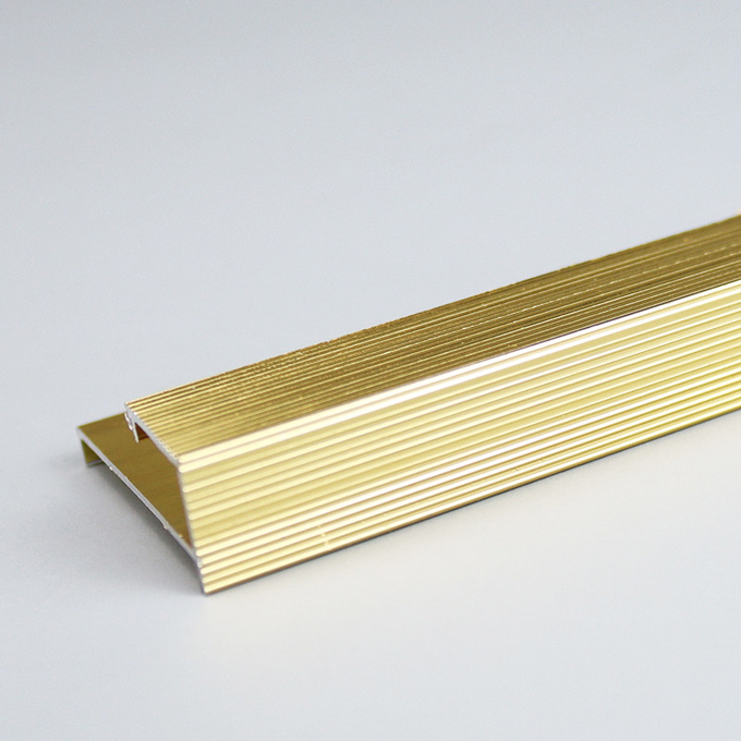 Aluminium d'or avec la pince smetal d'équilibre de tuile de bordure de tapis de clou simple de rangée