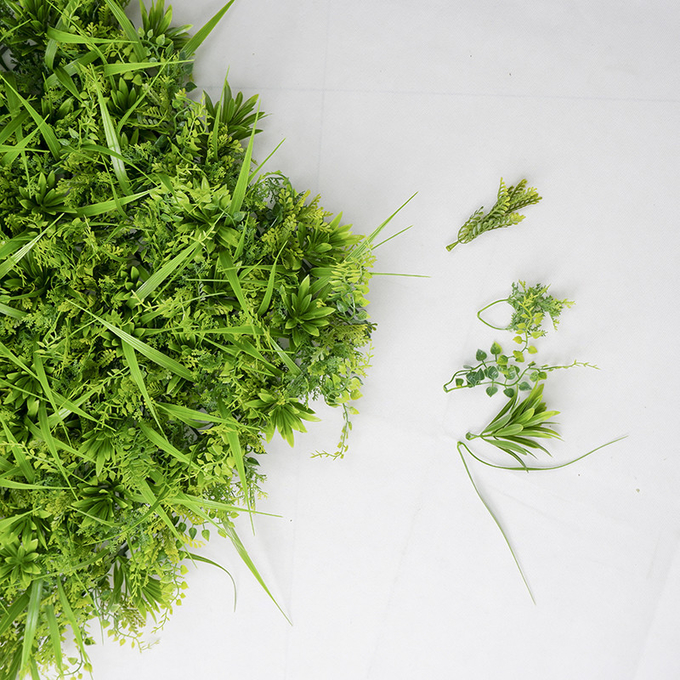 Le buis artificiel de haute qualité en plastique Anti-UV de haie lambrisse la plante verte